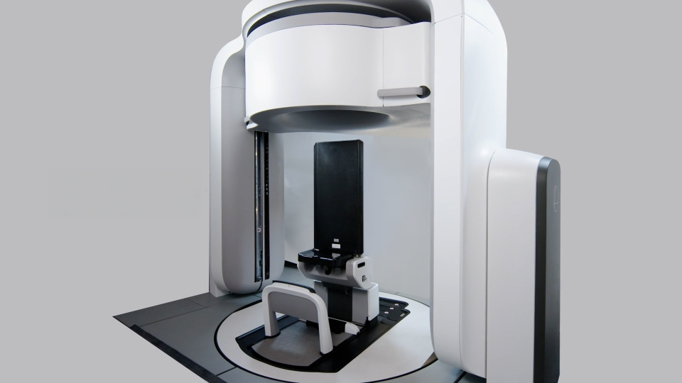 An image of Leo Cancer Care's Marie Solution, featuring upright patient positioning system and CT scanner